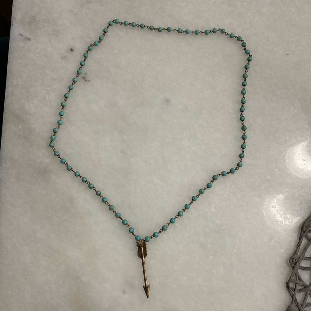 Turquoise necklace with arrow